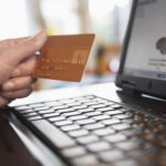 shopping online with credit card and computer