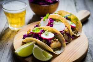 Fish tacos on wooden background near me