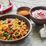 Mexican Rice with chilis garlic on table