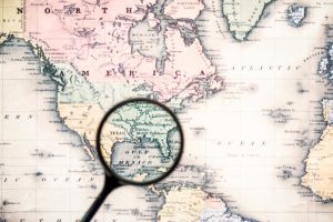 magnifying glass over map of mexico