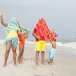 Family with best beach towels on beach