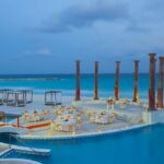 mexico beach wedding venue on clear blue sea with columns