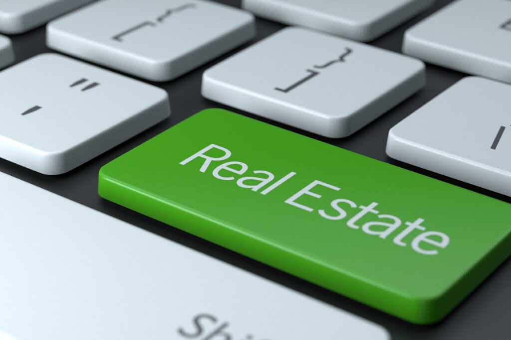 real estate investment newsletter keyboard