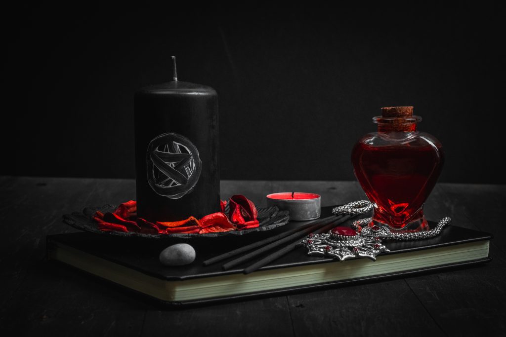 metaphysical book candle and potion